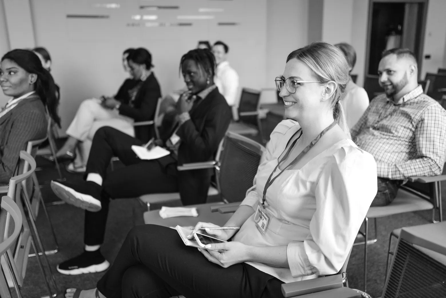 Collaborateurs d'une entreprise assis lors d'une conférence